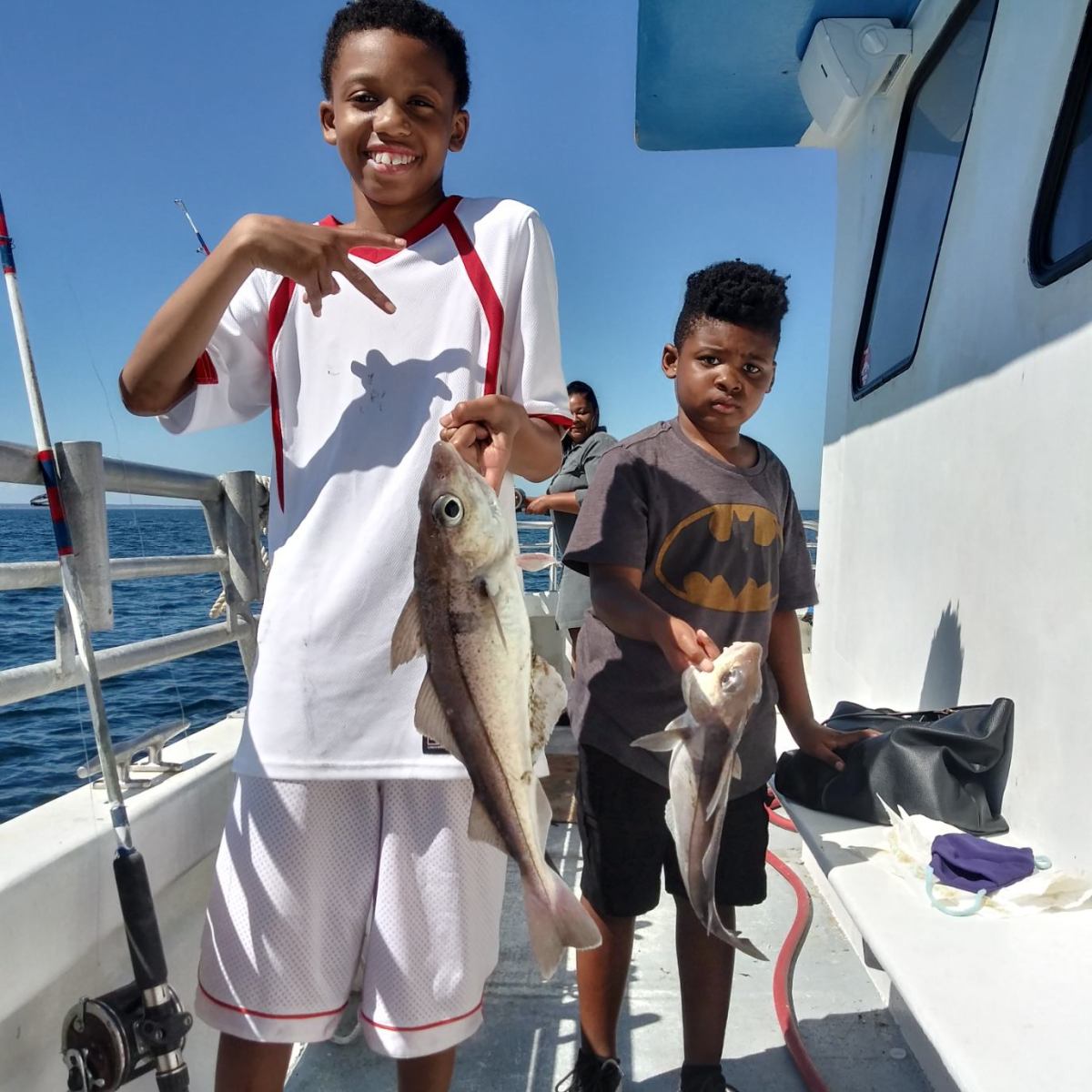 a group of people standing next to a person