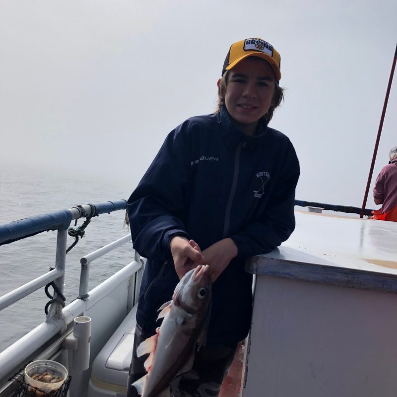 a person sitting on a boat