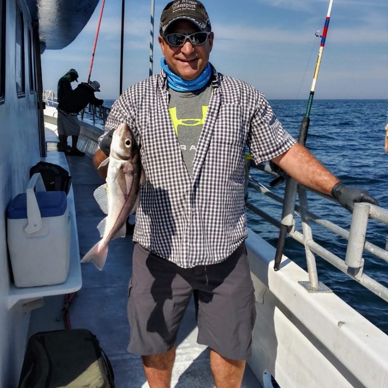 a man standing on a boat