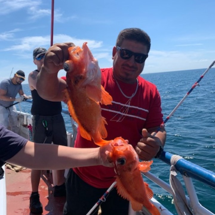 a man on a boat in the water