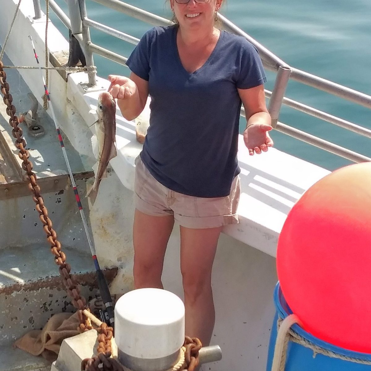 a person standing in front of a boat
