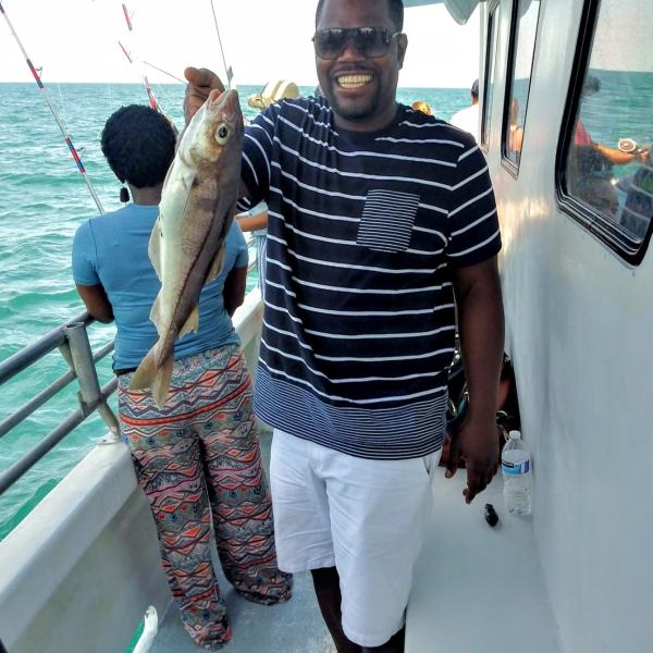 a man standing on a boat