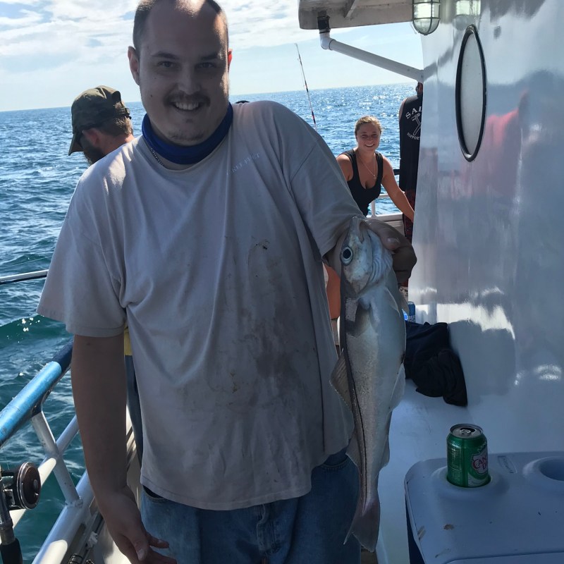 a man that is standing in the snow