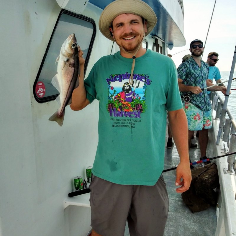 a person standing posing for the camera