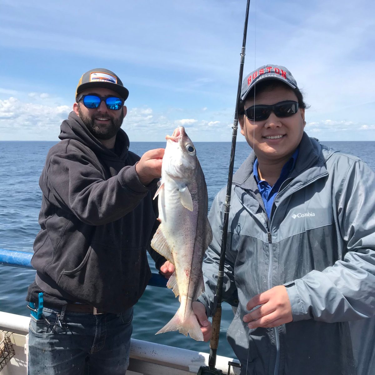 a person holding a fish