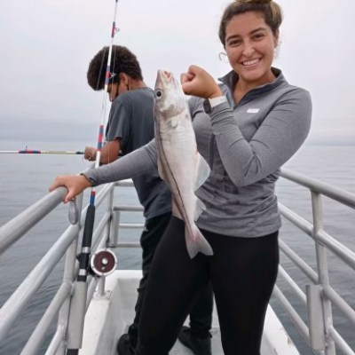 a person standing next to a dock