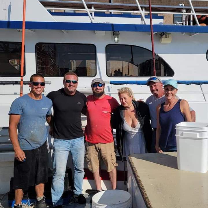 a group of people posing for the camera