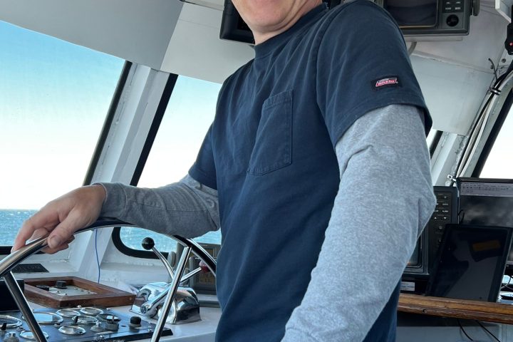 a person standing on a boat