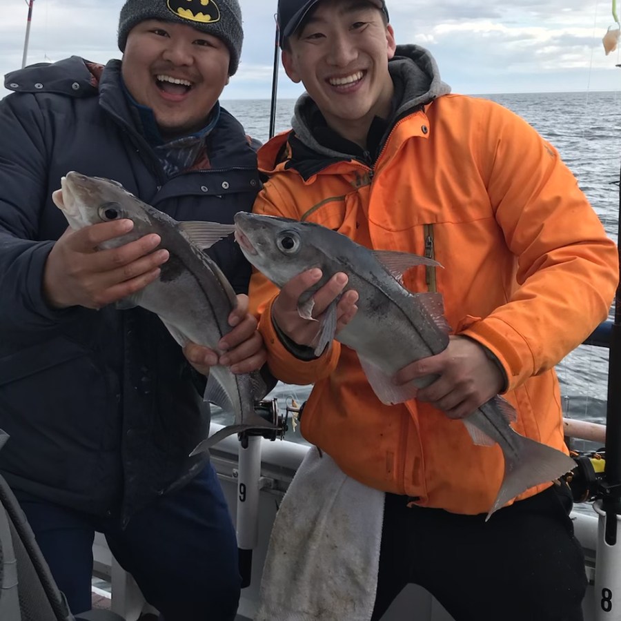 Abdullah Kobayashi holding a fish