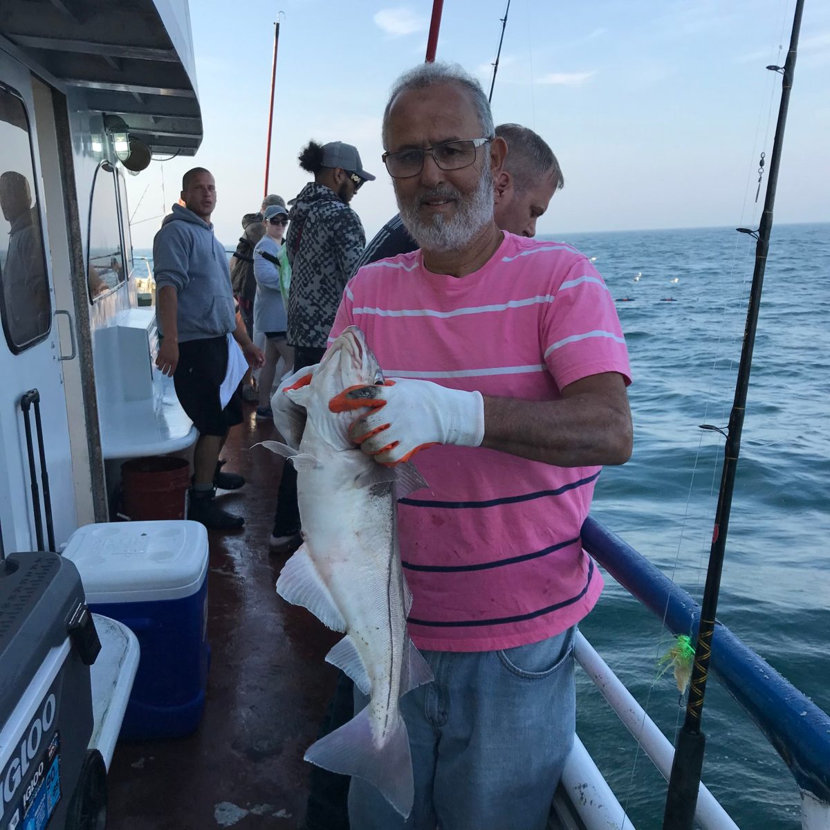 a couple of people that are standing in the water