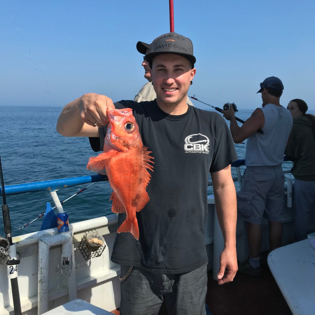 a man standing on a boat in the water
