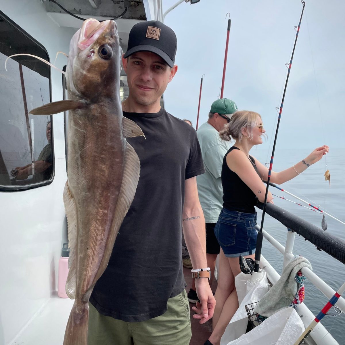 a person holding a fish