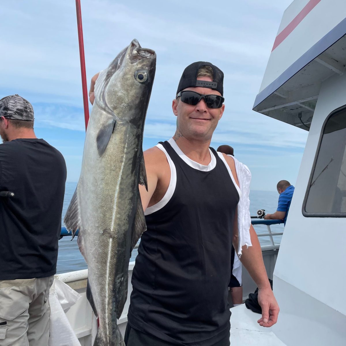 a person holding a fish