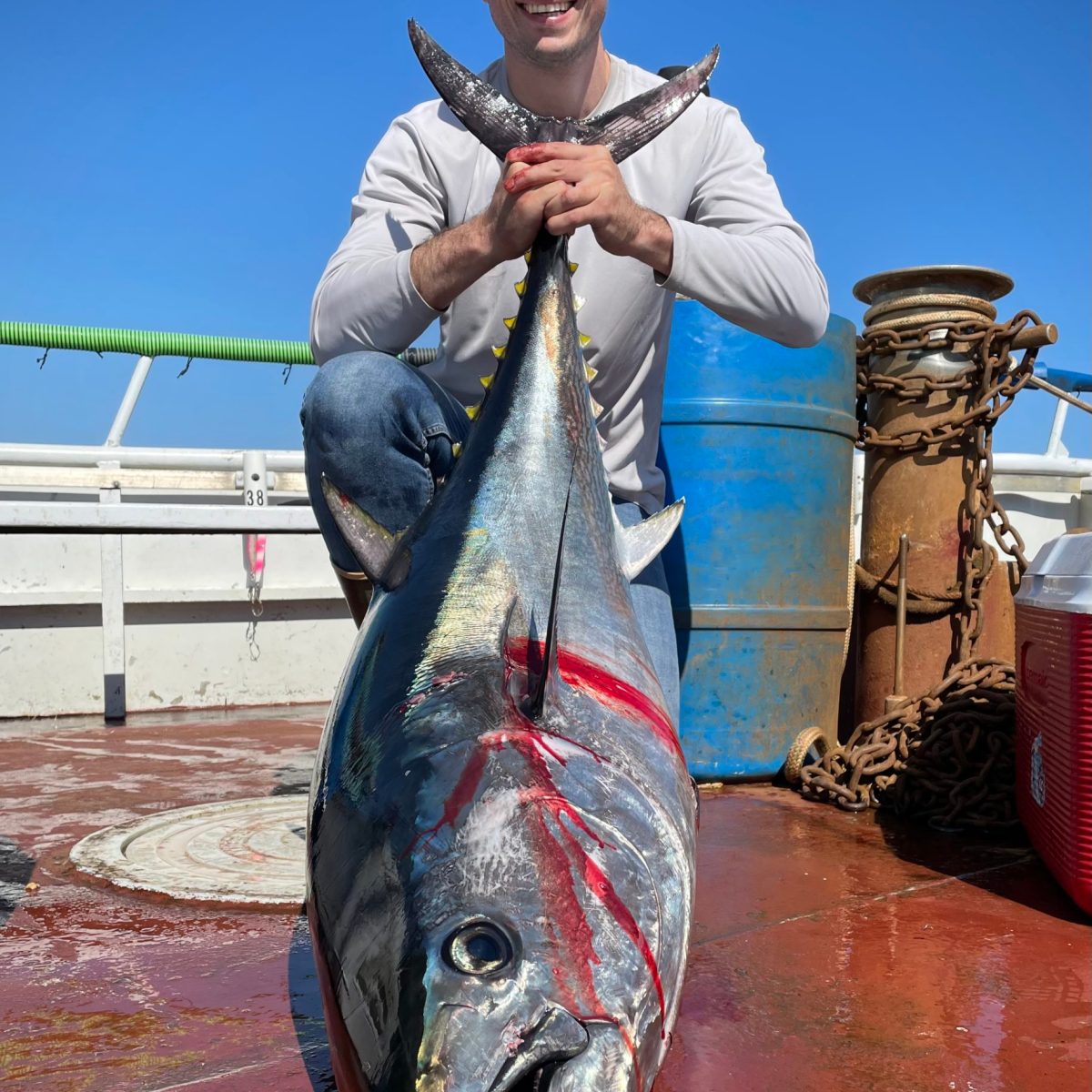 a person holding a fish