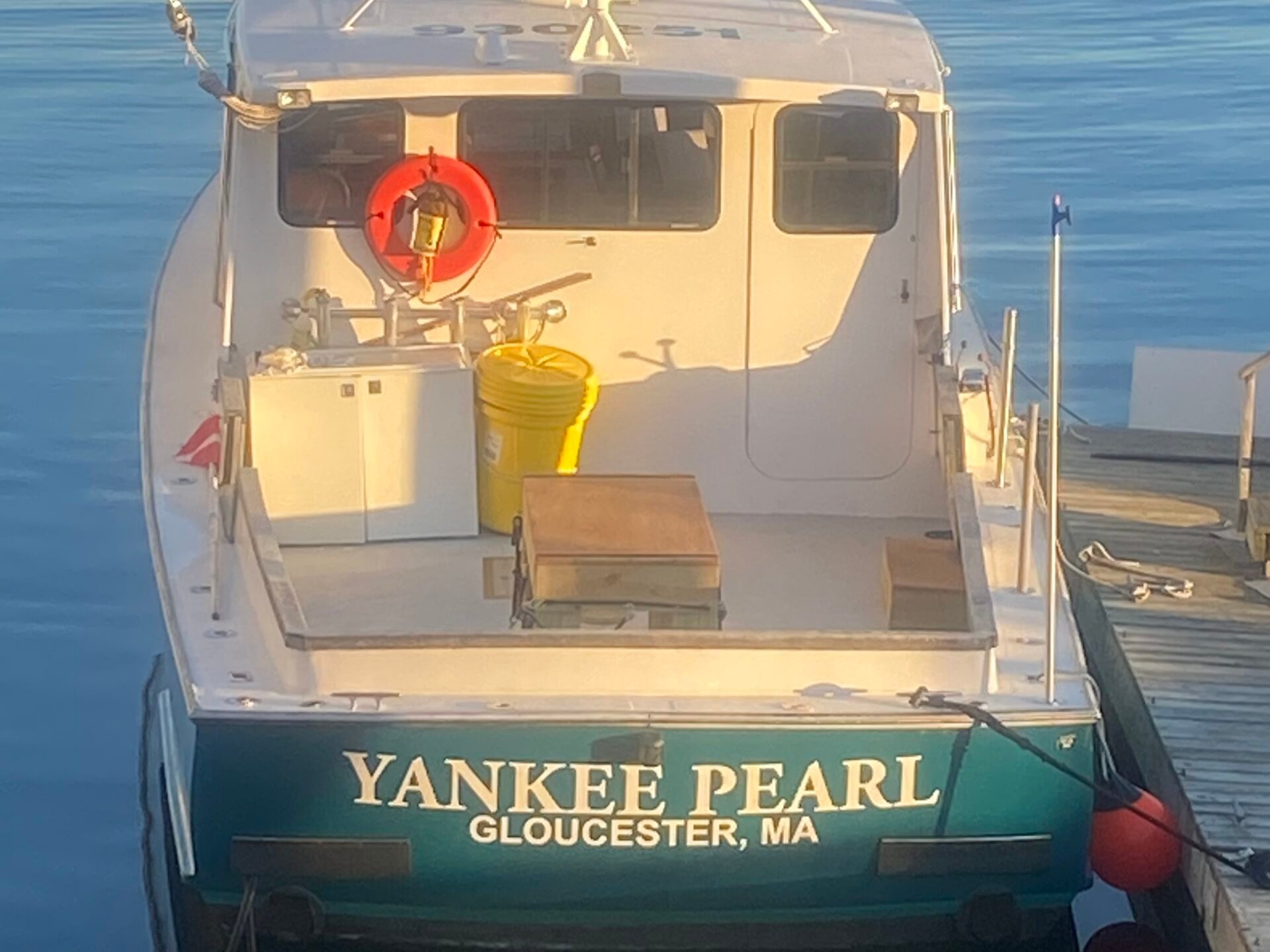 a small boat in a large body of water