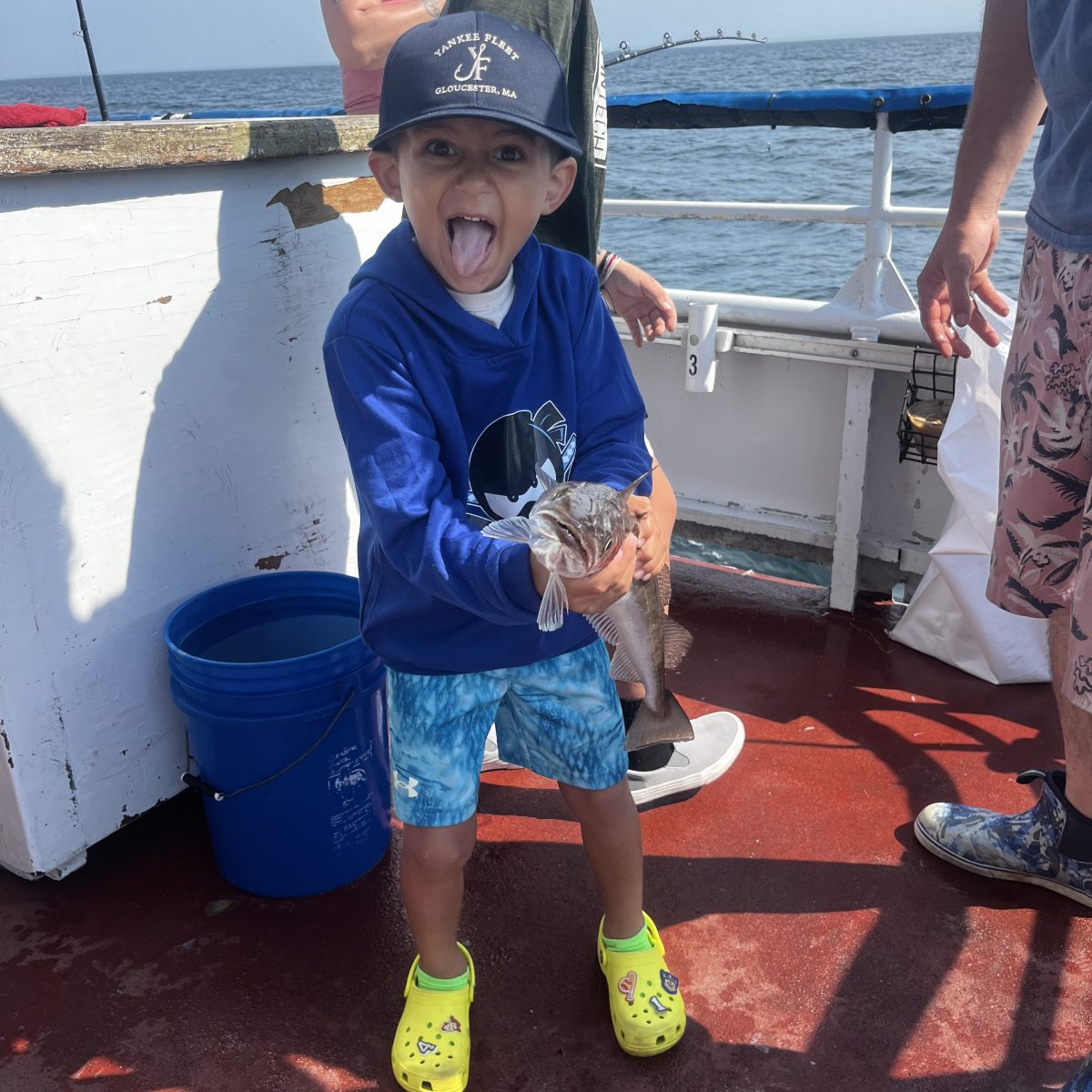 a little boy that is standing in the water