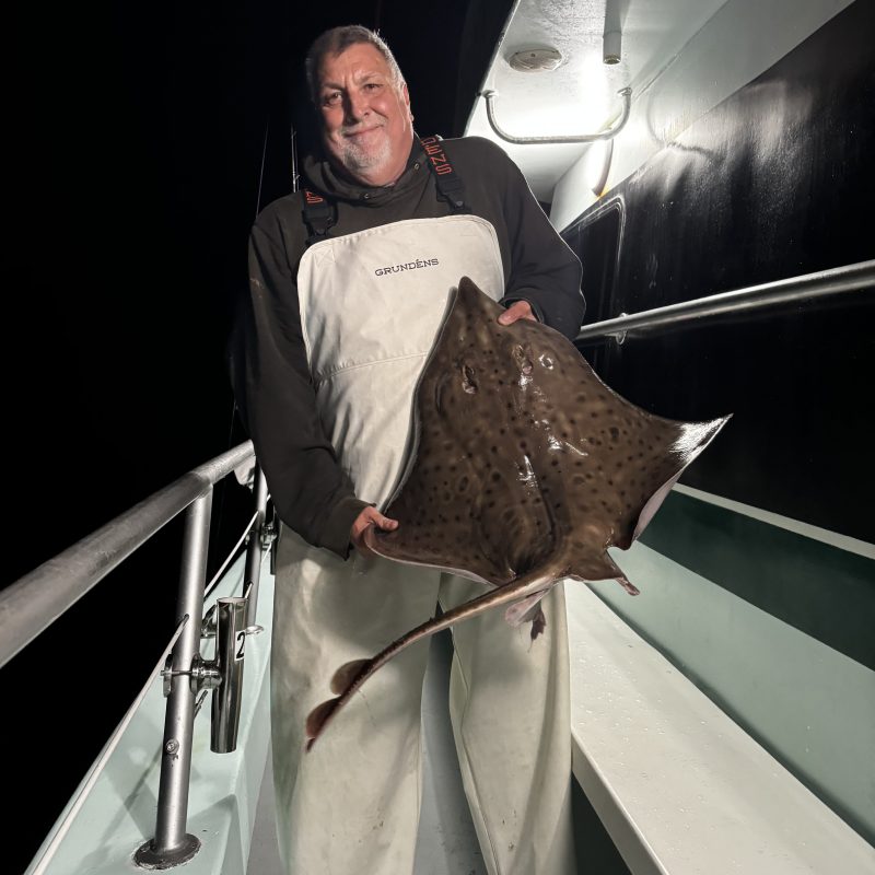 a man wearing a suit and tie