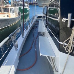 a boat is docked in the water