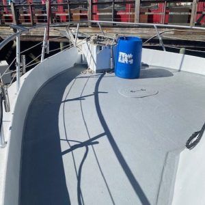 a train is parked on the side of a building