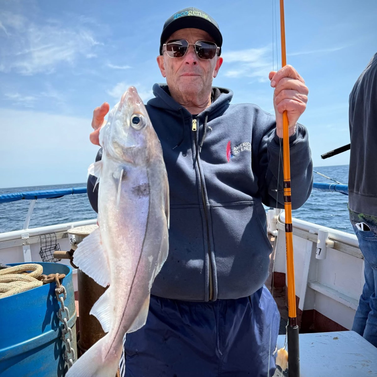 a person holding a fish