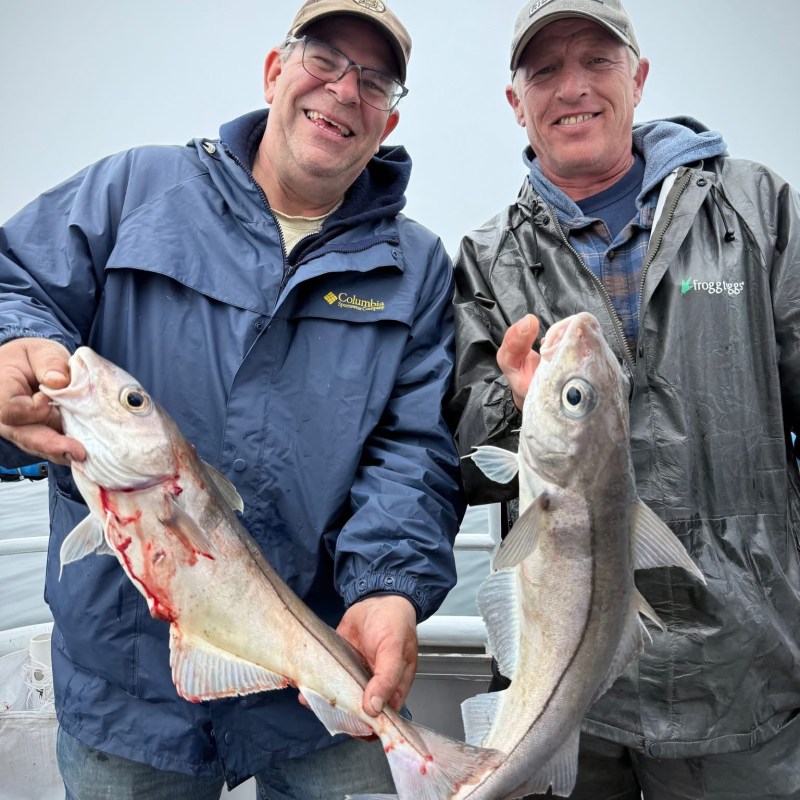 a person holding a fish