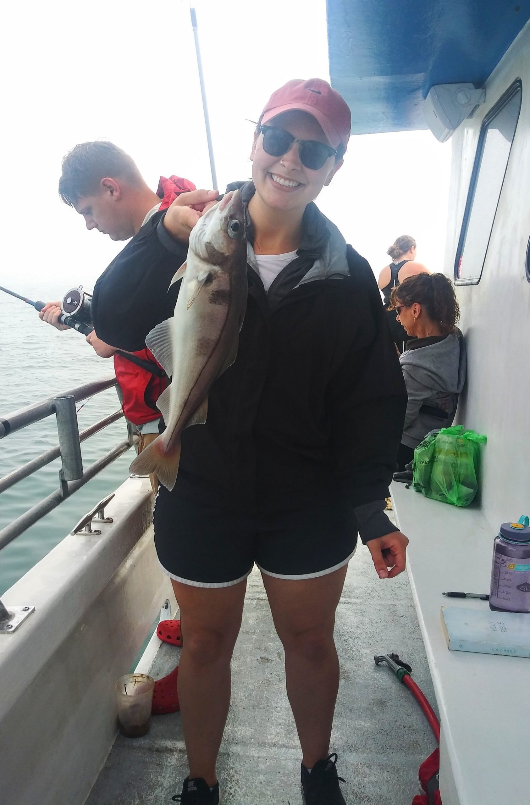 a group of people standing next to a person