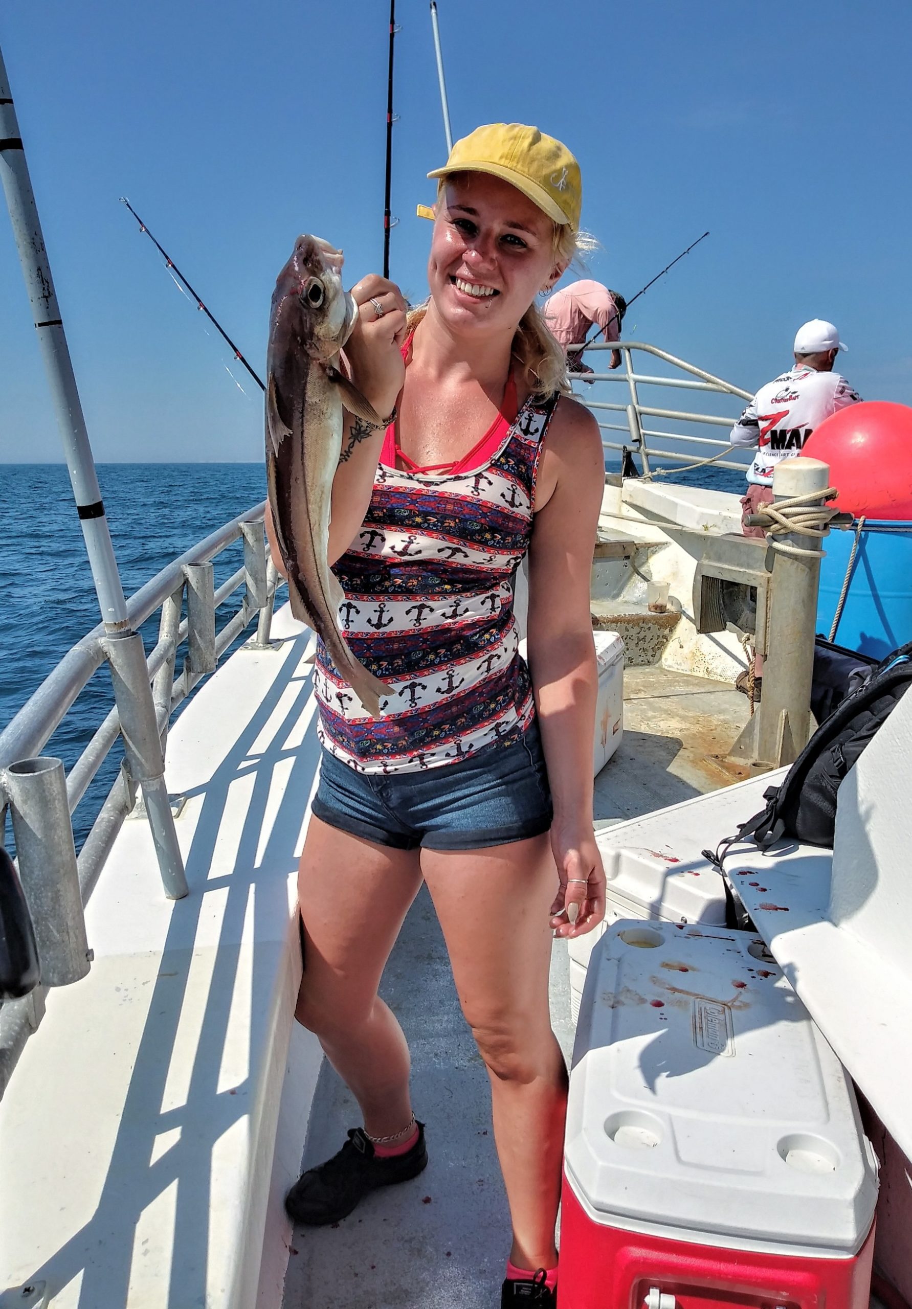 a woman standing on a boat
