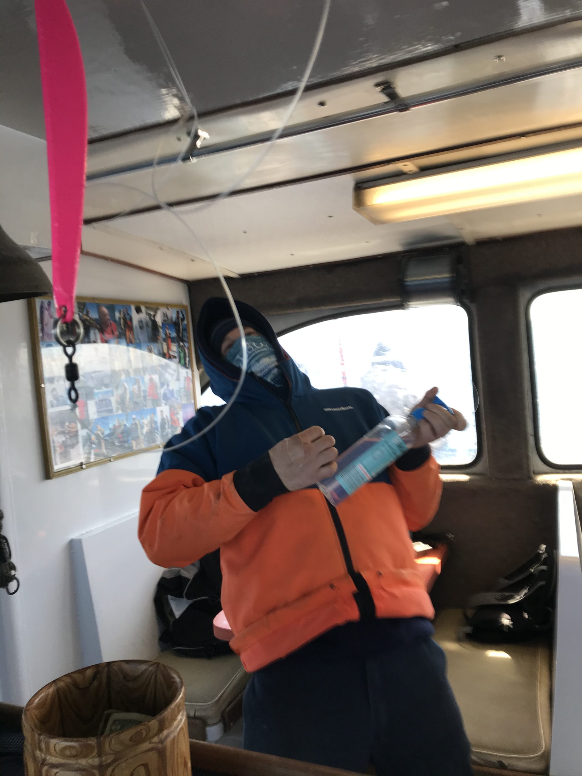 a person standing in front of a car