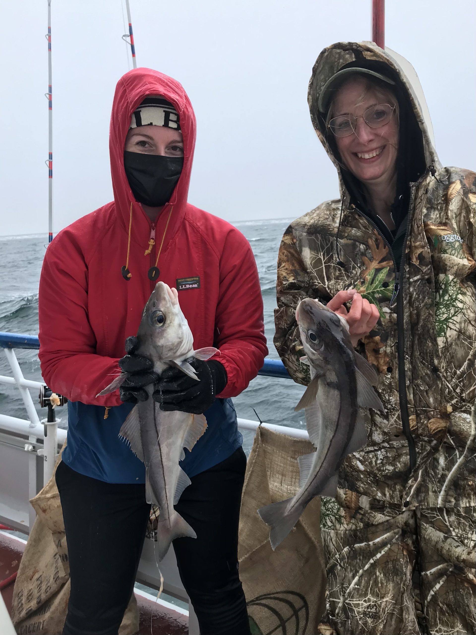 a person holding a fish