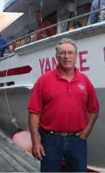 a man standing in front of a building