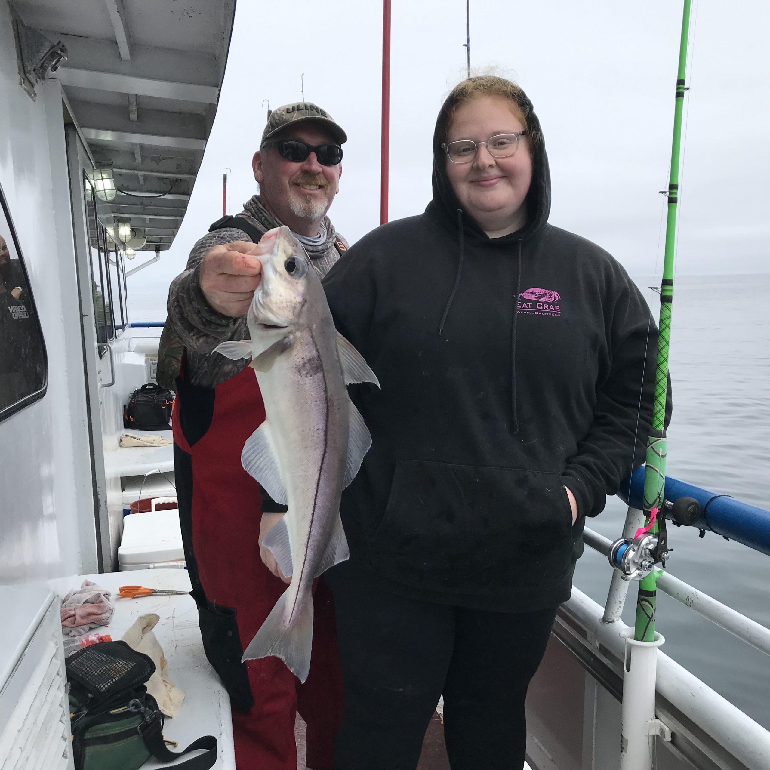 a person holding a fish